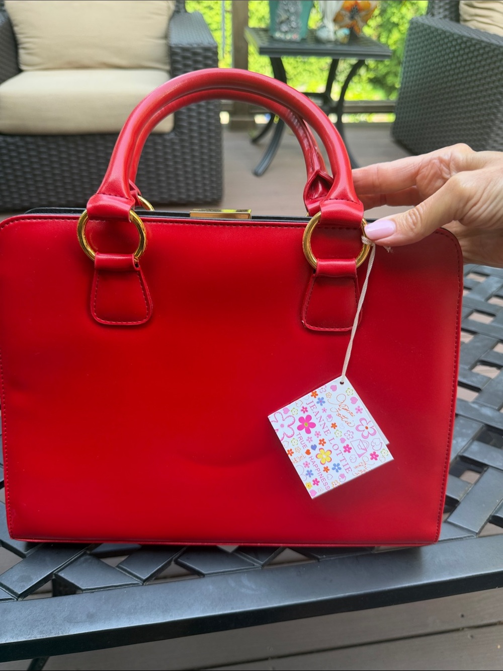 Jeanne Lottie Chic Red Structured Satchel with Gold Ring Accents. 13” x 10”